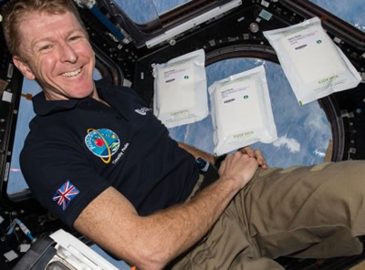 Tim Peake with seeds destined for Queen's Manor School in Fulham