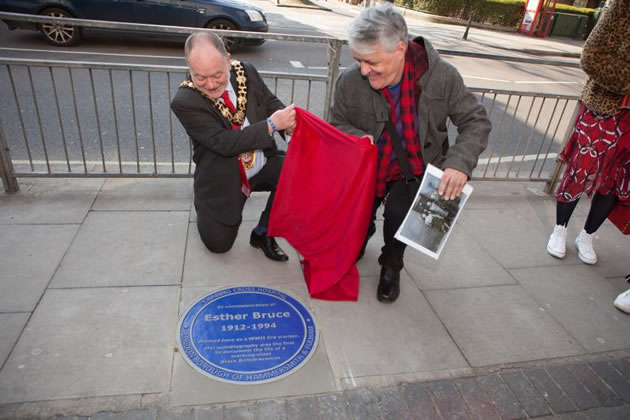 Mayor of H&F Cllr PJ Murphy (left) and Esther Bruce's adopted nephew Stephen Bourne (right) unveil the blue plaque