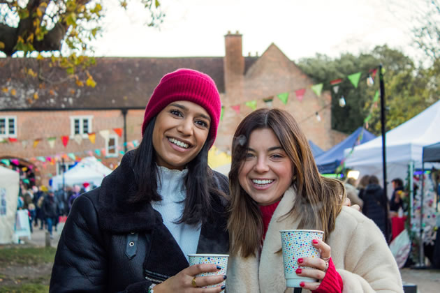 Revellers enjoy a previous Christmas Fair in Fulham Palace courtyard