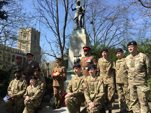 VC winner, L/C Johnson Beharry with members of the Fulham Army Cadet Force and of the new paving stone honouring Corporal Dwyer in the All Saints Memorial Garden
