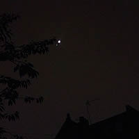 Police helicopter flying above blackout in Fulham