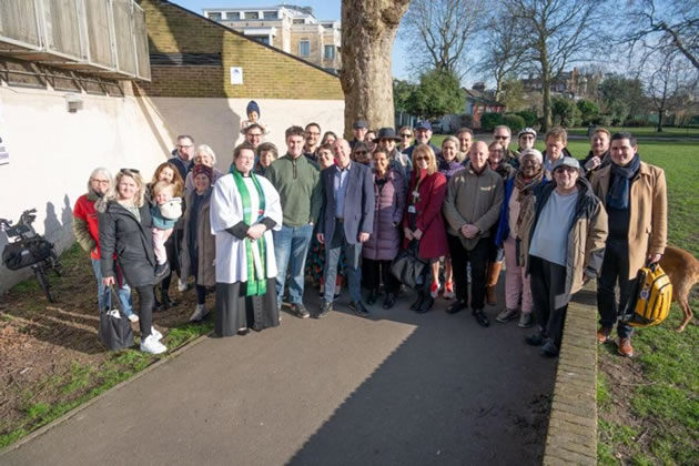 Residents and friends and family of Jenny Vaughan attend the garden naming event 