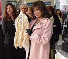 Joan Collins in Shooting Star Chase Charity Shop