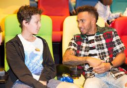 Lewis Hamilton with patient in Chslea and Westminster Hospital