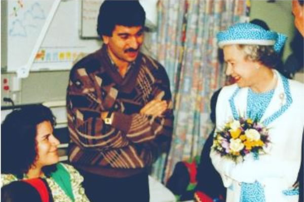 The Queen meets a patient at the hospital during her visit 