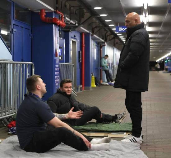 Michael Angus of the Barons Court Project (right) turns up to thank the fundraisers 