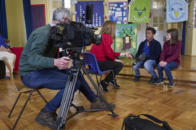 Queen’s Manor’s Head Boy and Head Girl being interviewed by ITV about their school’s fundraising efforts