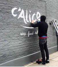 A'Alice sign being painted