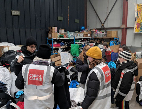 Latymer Upper students sort clothes for Care4Calais