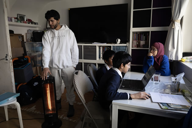 Family of Elan Sumon and Kusum Begum in their West London home. Picture: Facundo Arrizabalaga/MyLondon 