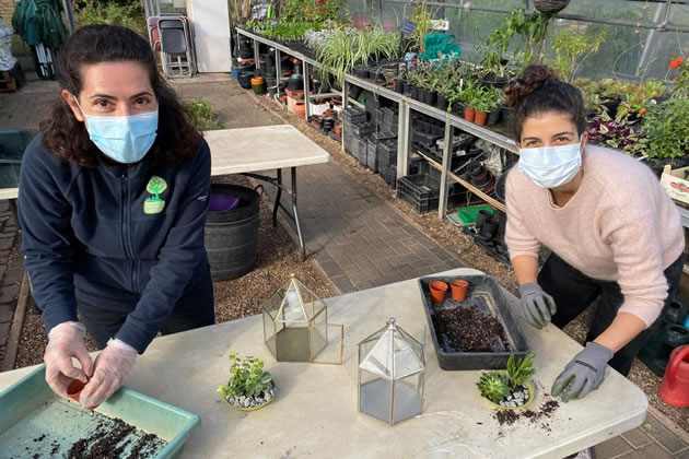 HCGA school and community gardener Poppy Gagiatsou working with volunteers