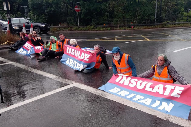 Insulate Britain protestors blocking a road