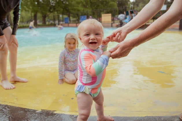 A user of the paddling pool in Ravenscourt Park