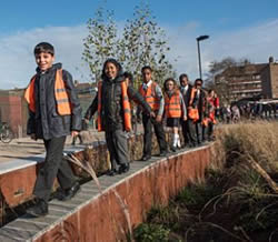 Children in the new "green oasis" in Australia Road in White City